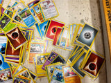 Bag of 80+ Pokémon Cards: Various Generations, colors, and characters