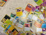 Bag of 80+ Pokémon Cards: Various Generations, colors, and characters